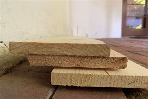 how long does treated wood need to dry before painting? what factors affect the drying time?